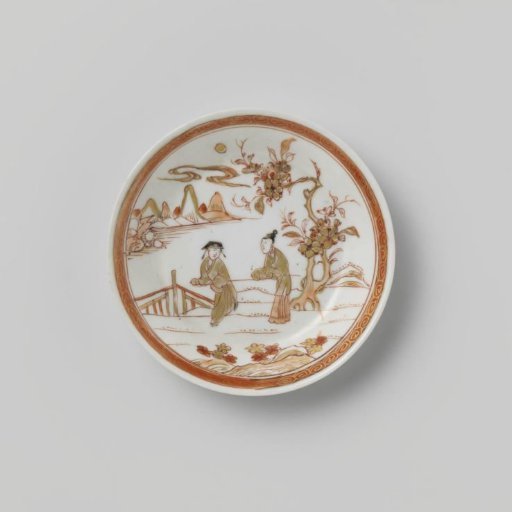 Saucer with two figures in a water landscape and a flowering tree