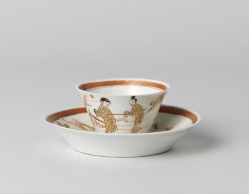 Cup and saucer with two figures in a water landscape and a flowering tree