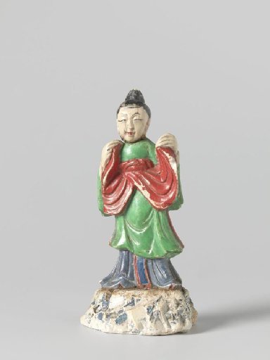 Female figure in green and red robe and blue undergarment