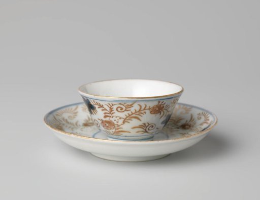 Bell-shaped cup and saucer with a flower basket and floral scrolls