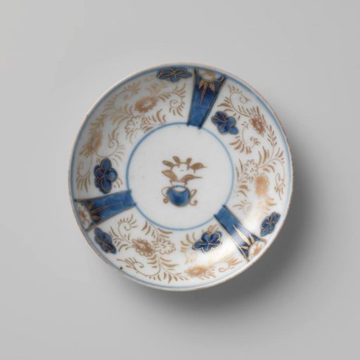 Saucer with a flower basket and floral scrolls