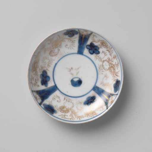 Saucer with a flower basket and floral scrolls