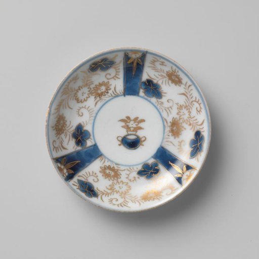 Saucer with a flower basket and floral scrolls