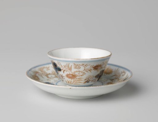 Bell-shaped cup and saucer with a flower basket and floral scrolls