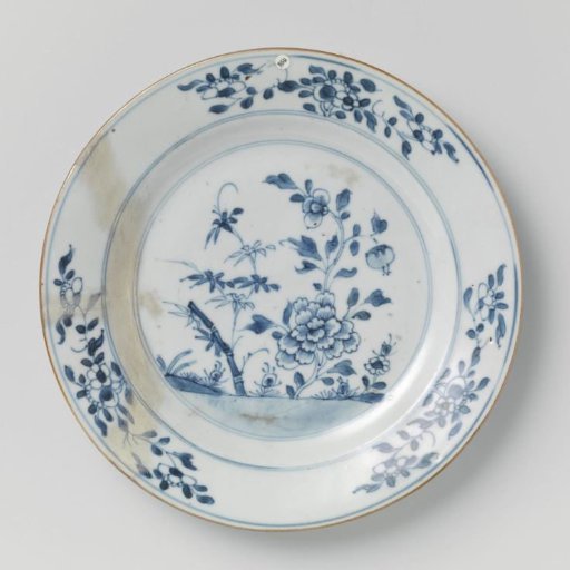 Plate with flowering plants and bamboo