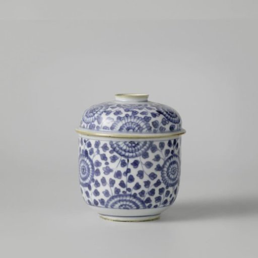 Covered jar with flower sprays and stylised chrysanthemums