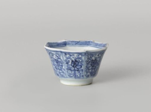 Octagonal cup with flower scrolls in panel decoration