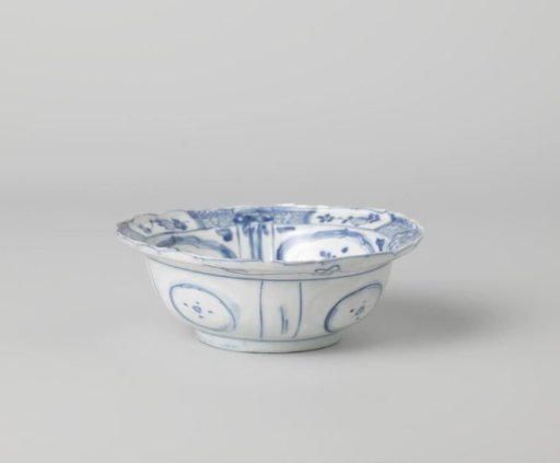 Klapmuts bowl with a cricket on a rock near flowering plants