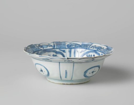 Klapmuts bowl with a rock, chrysanthemums and a butterfly