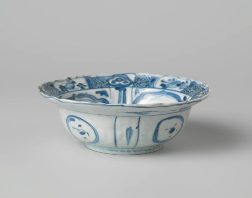 Klapmuts bowl with a butterfly near flowering plants