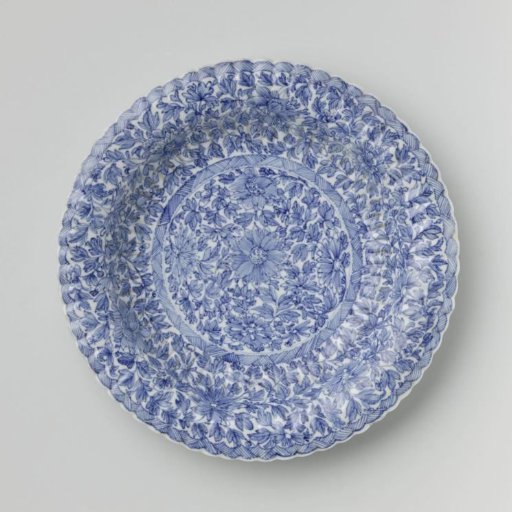 Plate with fluted sides and continuous flower pattern