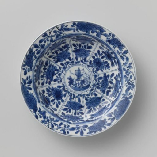 Saucer with panels in the shape of a flowerhead filled with flower sprays