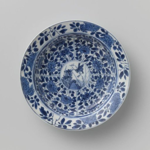 Saucer with panels in the shape of a flowerhead filled with flower sprays