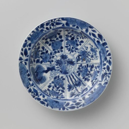 Saucer with panels in the shape of a flowerhead filled with flower sprays