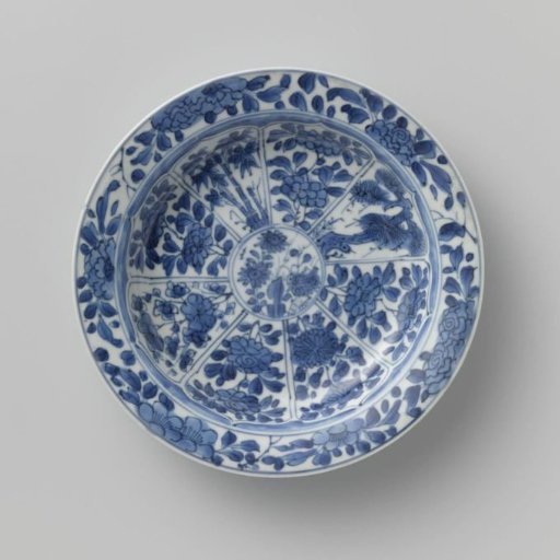 Saucer with panels in the shape of a flowerhead filled with flower sprays