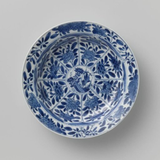 Saucer with panels in the shape of a flowerhead filled with flower sprays