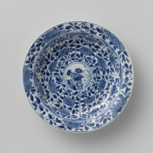 Saucer with panels in the shape of a flowerhead filled with flower sprays