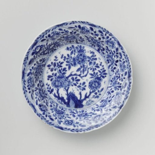 Saucer with twisted panels and flower sprays