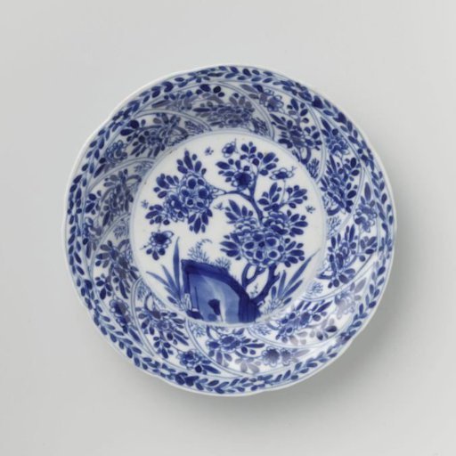 Saucer with twisted panels and flower sprays