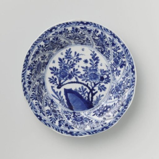 Saucer with twisted panels and flower sprays