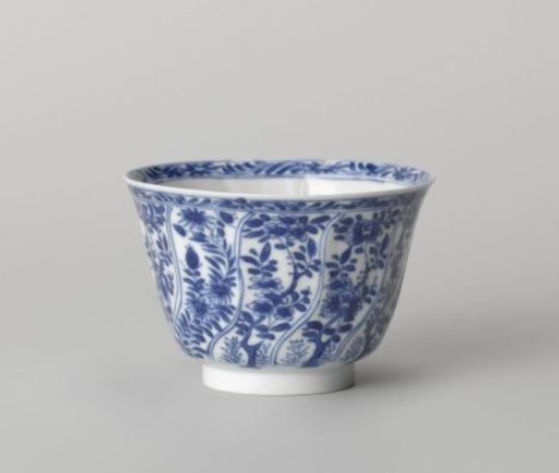 Cup with twisted panels with flower sprays