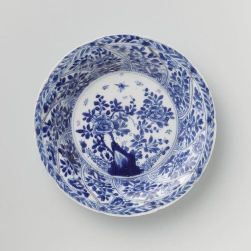 Saucer with twisted panels and flower sprays