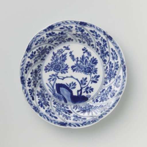 Saucer with twisted panels and flower sprays