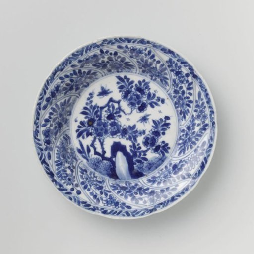 Saucer with twisted panels and flower sprays