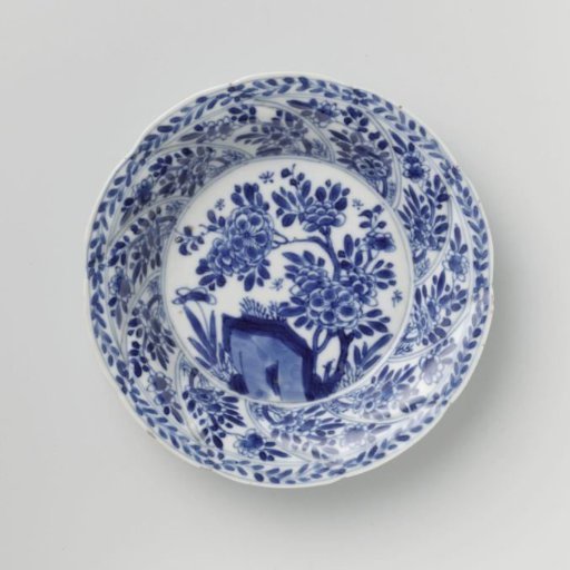 Saucer with twisted panels and flower sprays