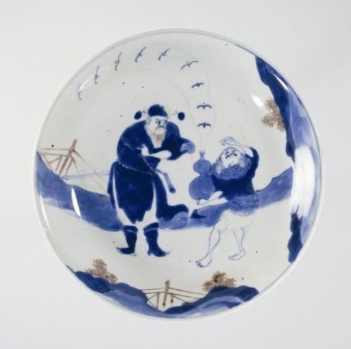 Saucer-dish with two figures in a landscape
