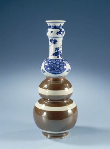 Triple gourd-shaped bottle with brown glaze and flower scrolls