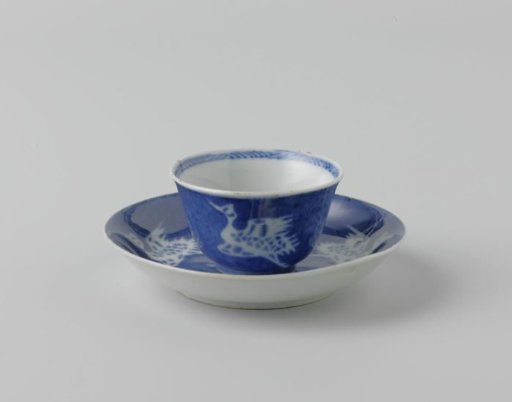 Cup and saucer with powder blue and cranes