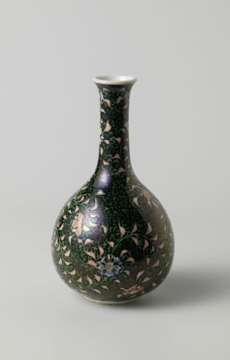 Pear-shaped bottle vase with flower scrolls on a black ground