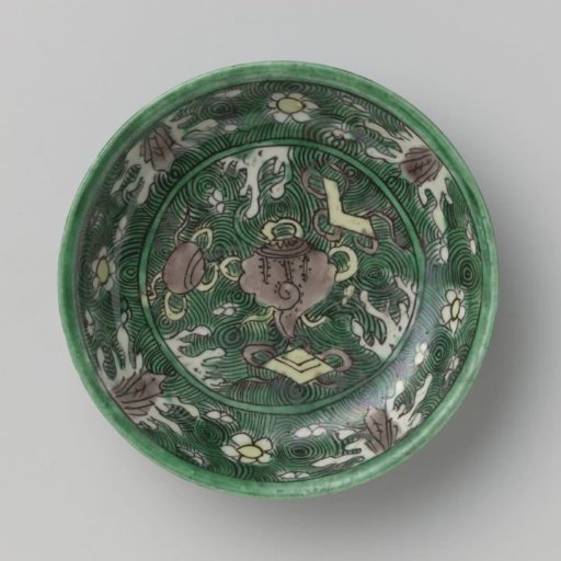 Saucer with precious objects on a green ground with cloud motifs
