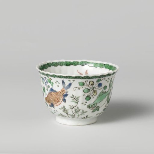 Cup with fish between water plants