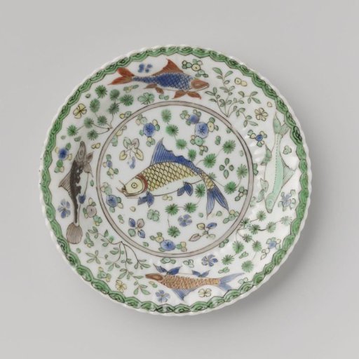 Saucer with fish between water plants
