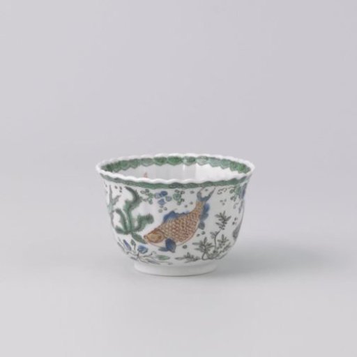 Cup with fish between water plants
