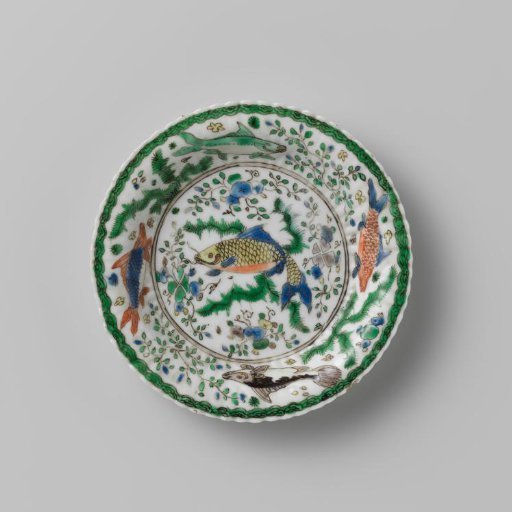 Saucer with fish between water plants