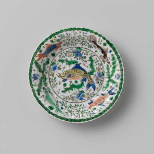 Saucer with fish between water plants