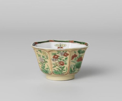 Octagonal cup with light brown, animals and flower sprays