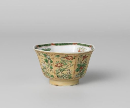 Octagonal cup with light brown, animals and flower sprays