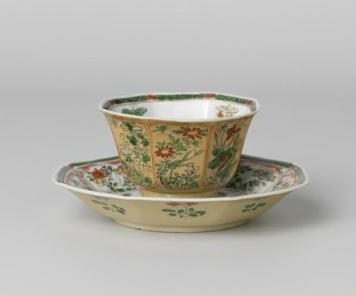 Octagonal cup and saucer with light brown, animals and flower sprays