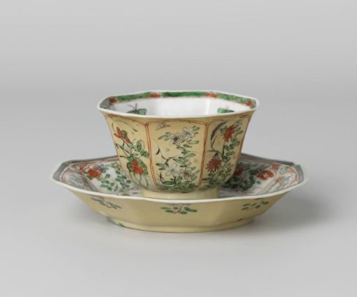 Octagonal cup and saucer with light brown, animals and flower sprays
