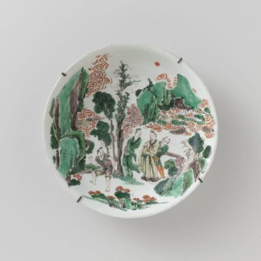 Saucer-dish with four figures in a rocky landschape