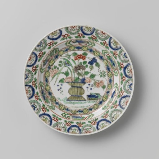 Plate with a flower basket and precious objects