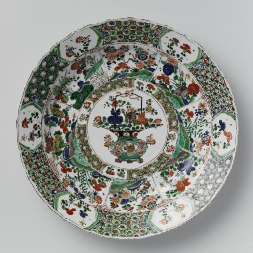 Dish with a flower basket, flowering plants and diaper patterns