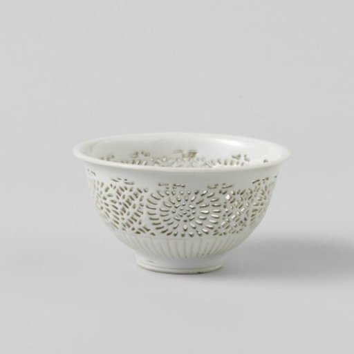 White bowl with pierced sides