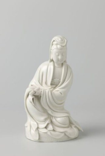 Figure of a seated Guanyin holding a scroll