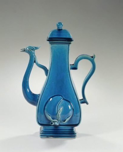 Pear-shaped wine ewer with peach and spout ending in a bird's head