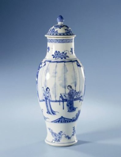 Baluster covered vase with women in a fenced garden